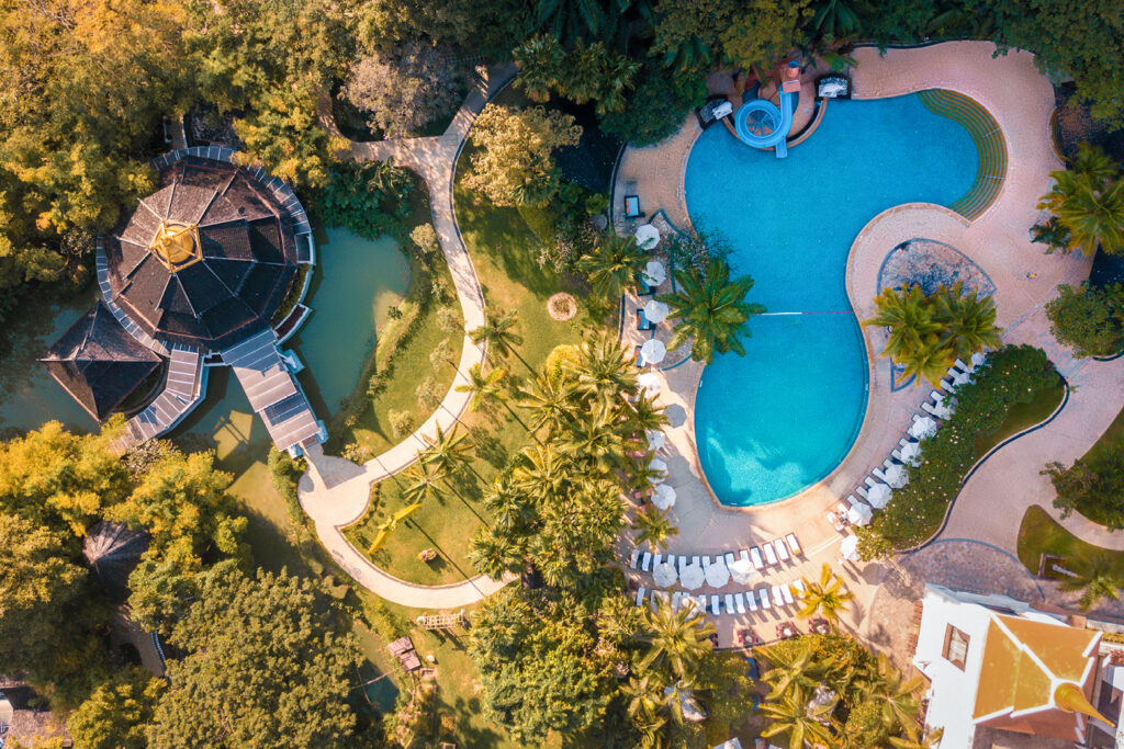 Shangri La Chiang Mai includes a large. sparking pool with water slides and Kids Splash area.